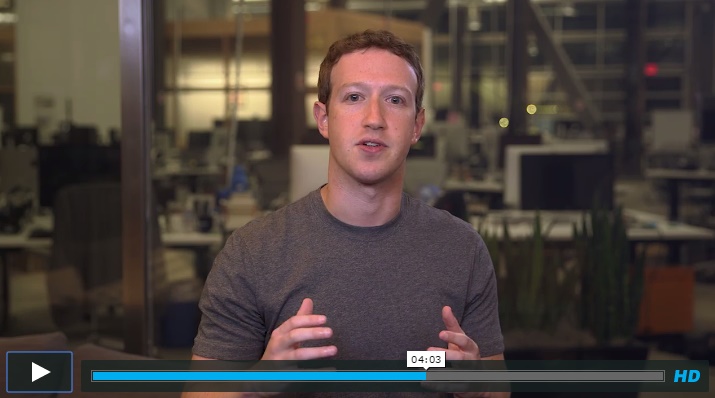 PrintScreen de um vídeo em que o Mark Zuckerberg está falando. Mark está com uma camiseta de manga longa marrom e gesticula com as mãos.